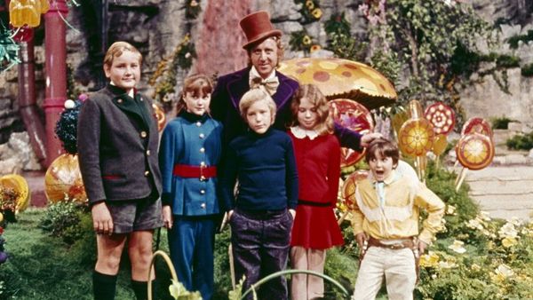 Willy Wonka and kids on chocolate factory photo